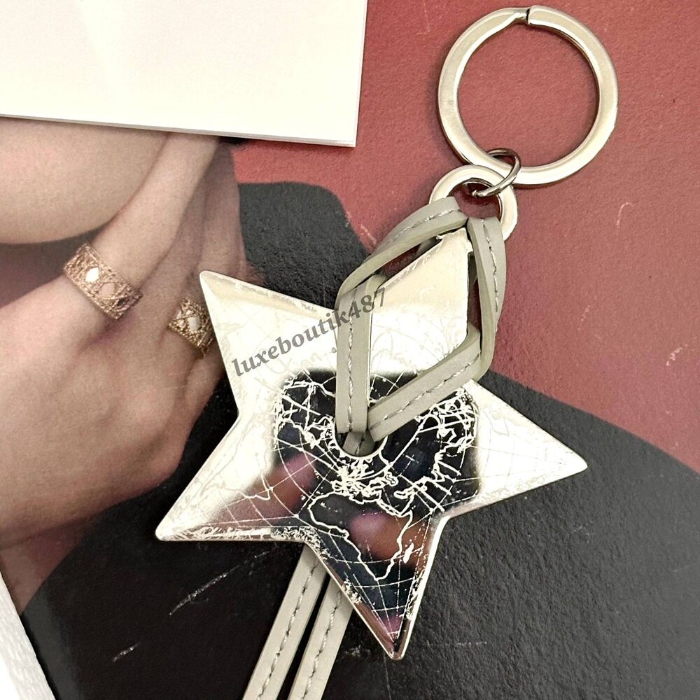 Dior Silver Around The World Star Keychain